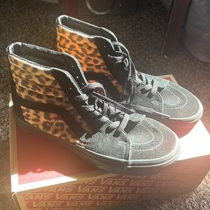 Vans shoes high tops  (animal print) size 6 in men and 7.5 in women